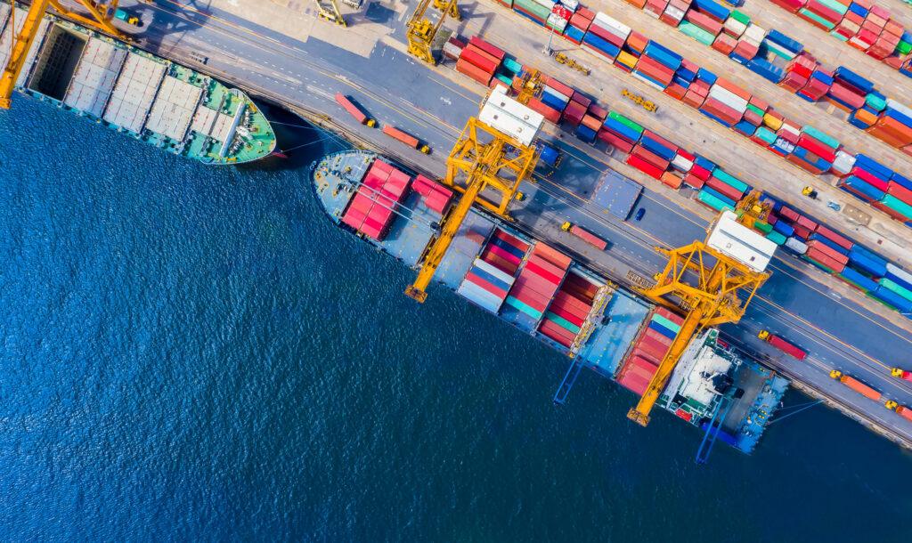 Aerial view of ship loaded with containers at port